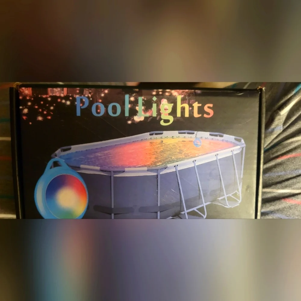 Swimming pool light. NIB. Multicolored remote control. Party for pools!